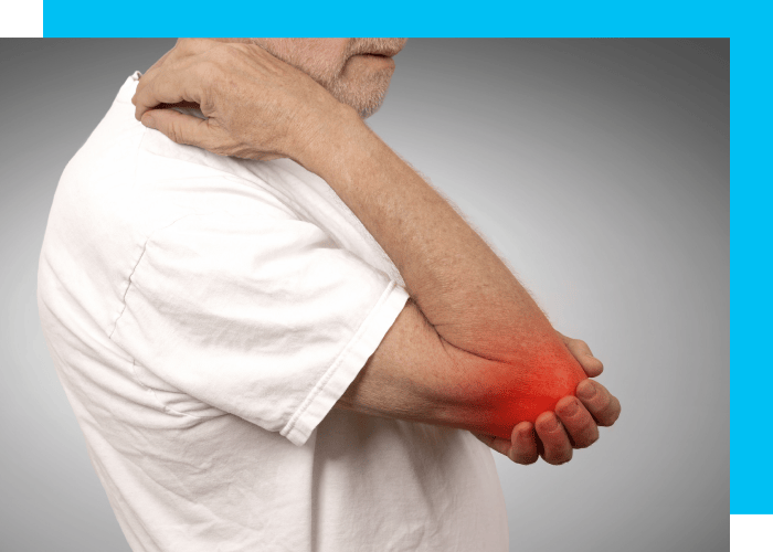 An individual experiencing discomfort in the elbow region.