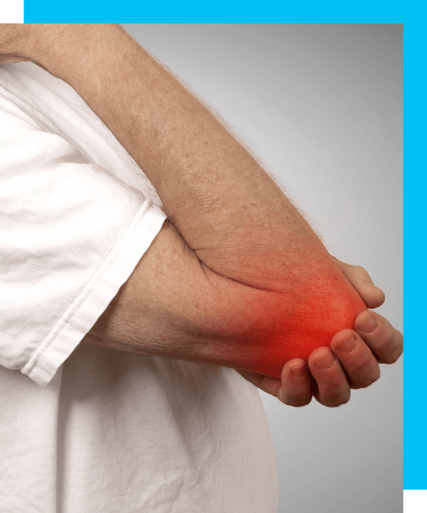 A close-up shot of a patient holding his elbow in pain.
