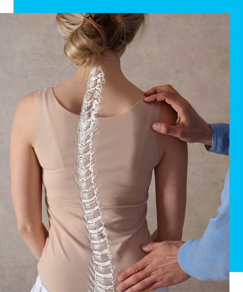 A doctor diagnosing a female patient with a spine problem.